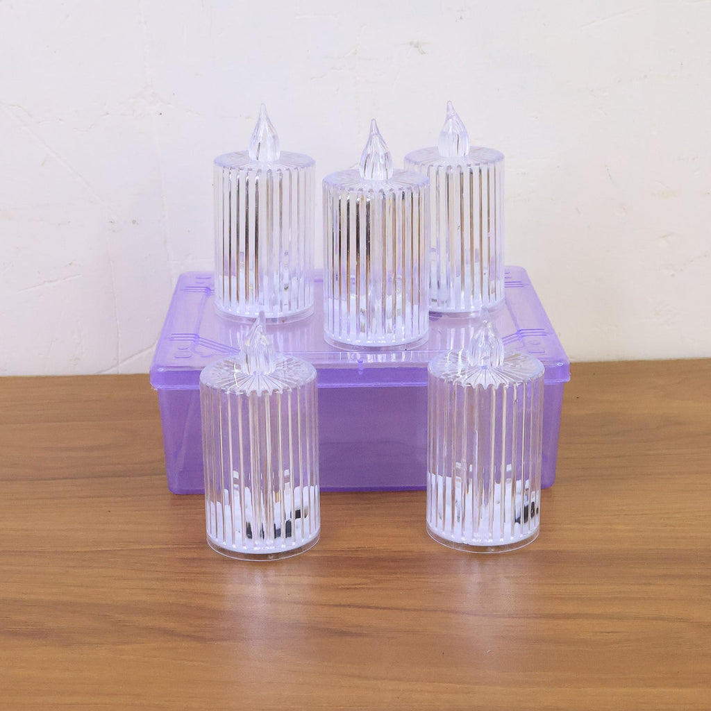 Set of premium LED flameless candles creating festive ambience