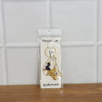 Krishna keychain with multiple charms and sturdy metal key ring