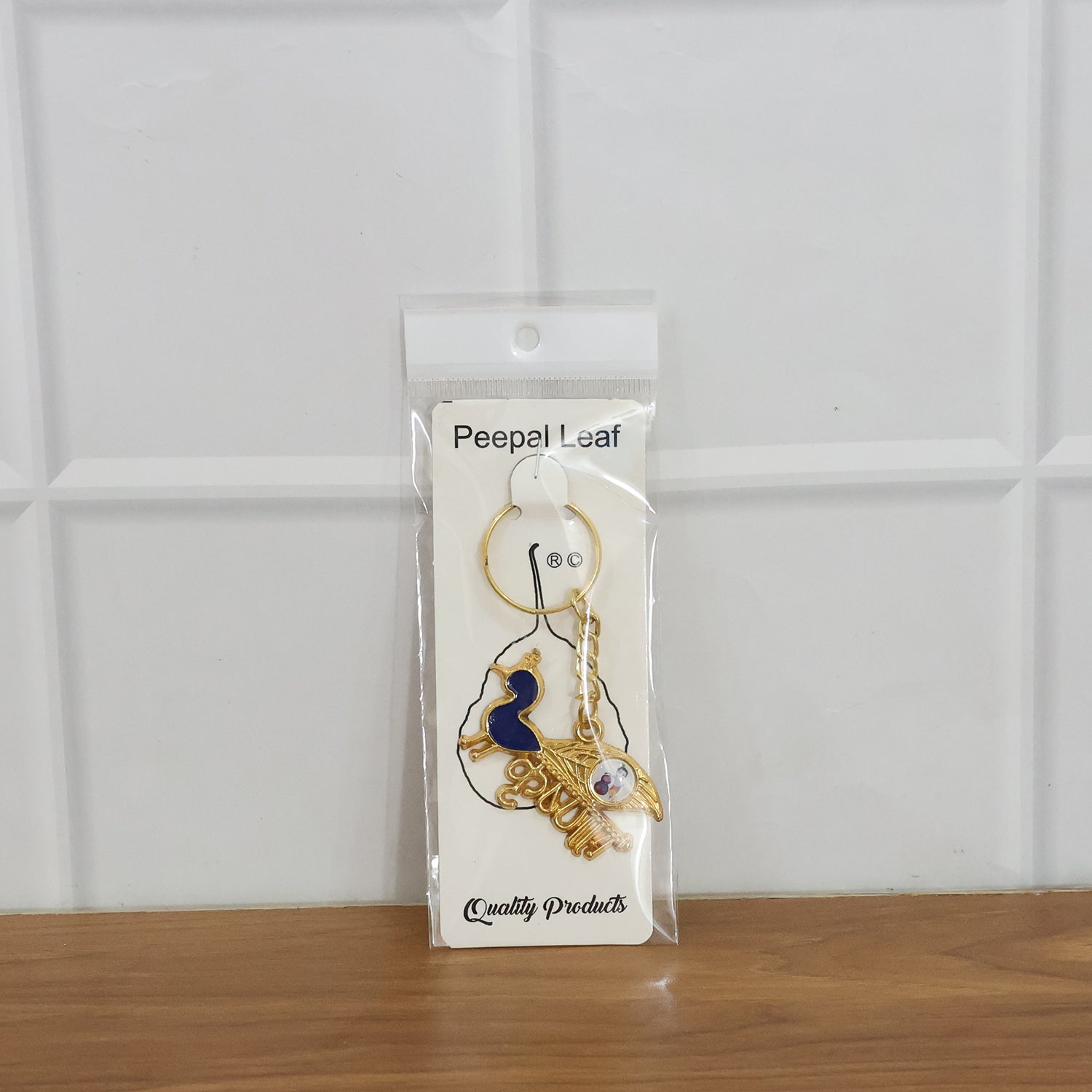 Krishna keychain with multiple charms and sturdy metal key ring