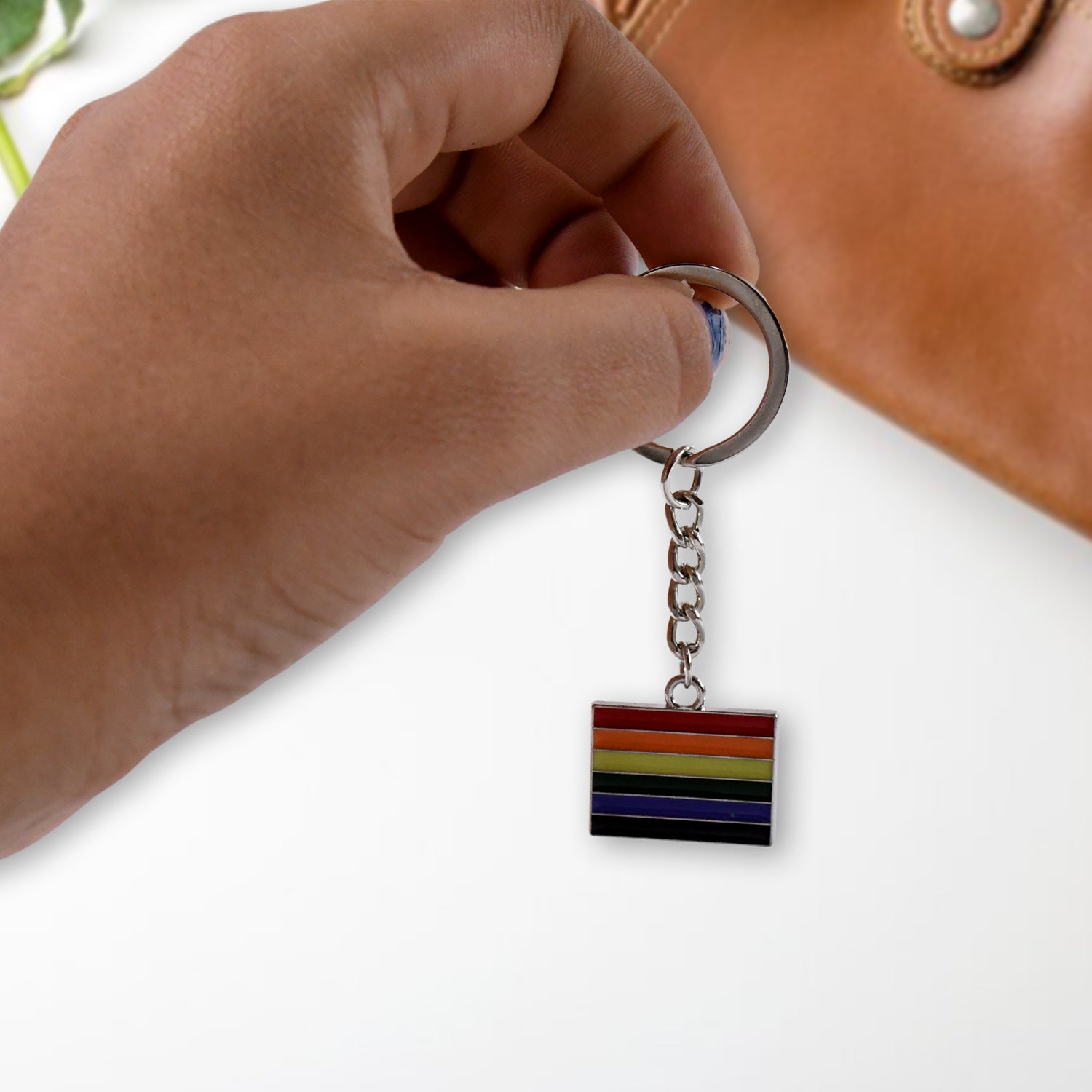 Rainbow metal keyring displaying prism effect and polished finish