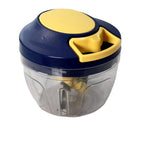 Freshly chopped vegetables inside the transparent container of the kitchen tool.