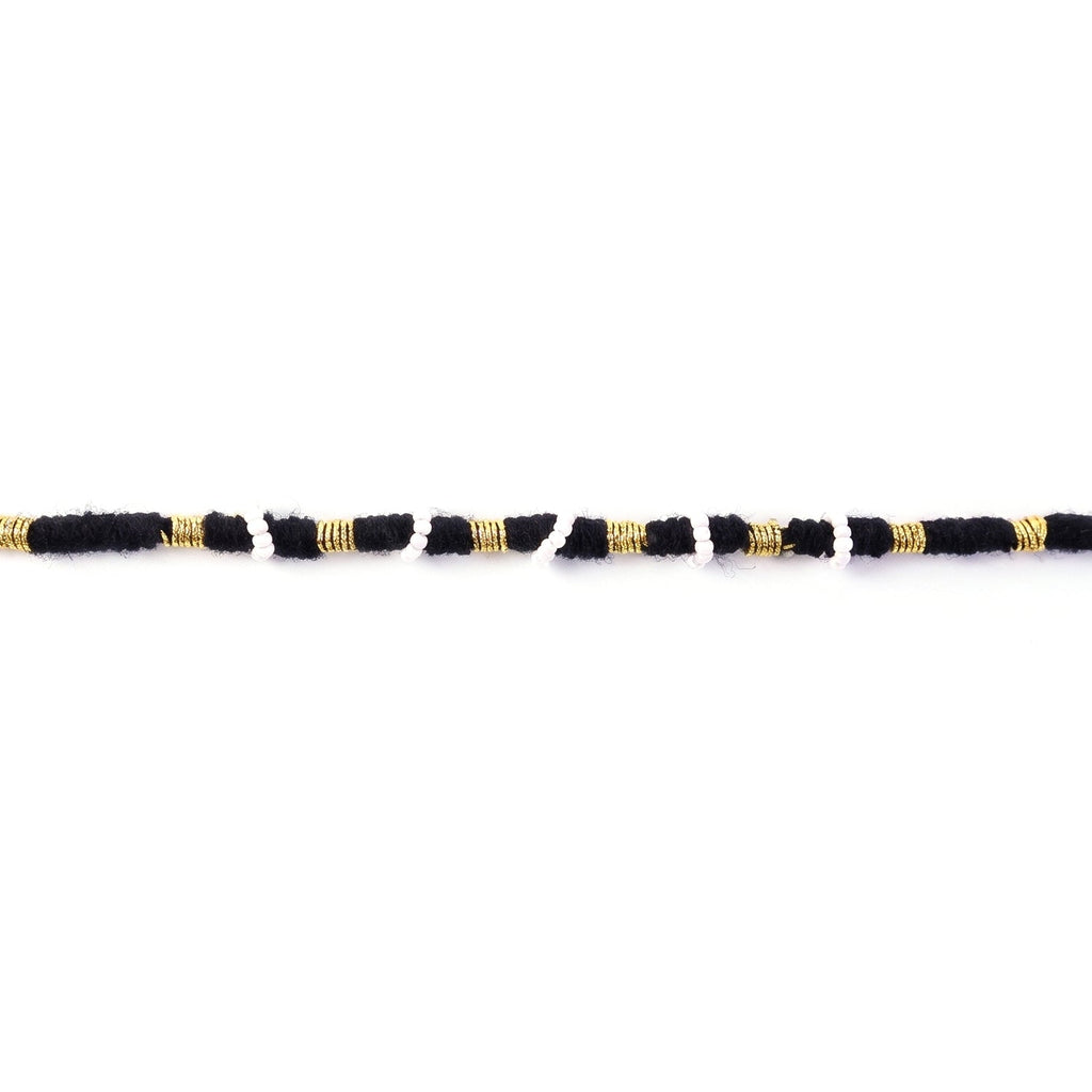 Traditional ethnic black and white beaded rakhi