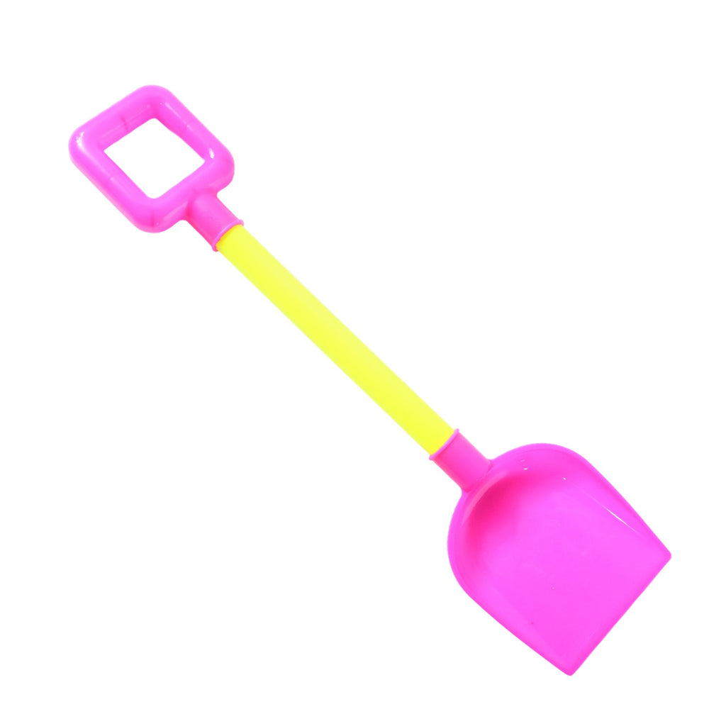 Castle shaped sand shovel in sand illustrating kids beach toy