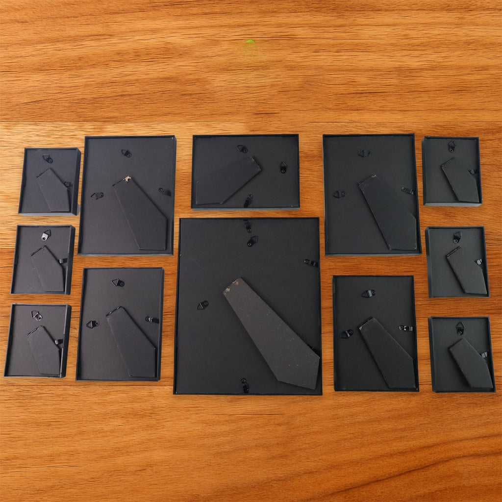 Premium matte black plastic photo frames arranged in a 12-piece set