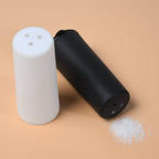 Polycarbonate spice dispensers with a clean, minimalist design.