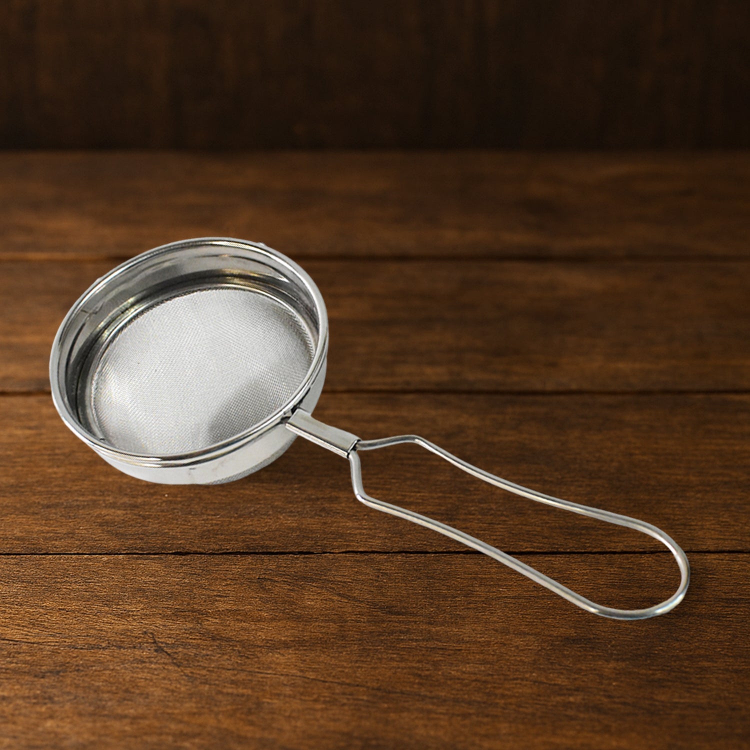 Ergonomic handle and hanging hook feature of stainless steel tea strainer