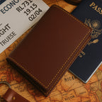 PU leather card holder held in hand showcasing its slim profile and stitching detail