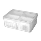 Detailed view of the sturdy, transparent plastic construction of the fridge storage box.