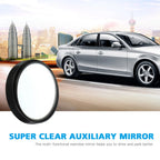 Hand holding a car blind spot mirror demonstrating easy installation