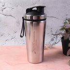 Fitness shaker bottle with spring whisk for smooth protein mixing