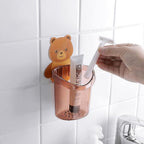 Brightly colored teddy bear toothbrush holder for children