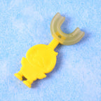 Soft silicone bristles on kid's duck design toothbrush for gentle cleaning