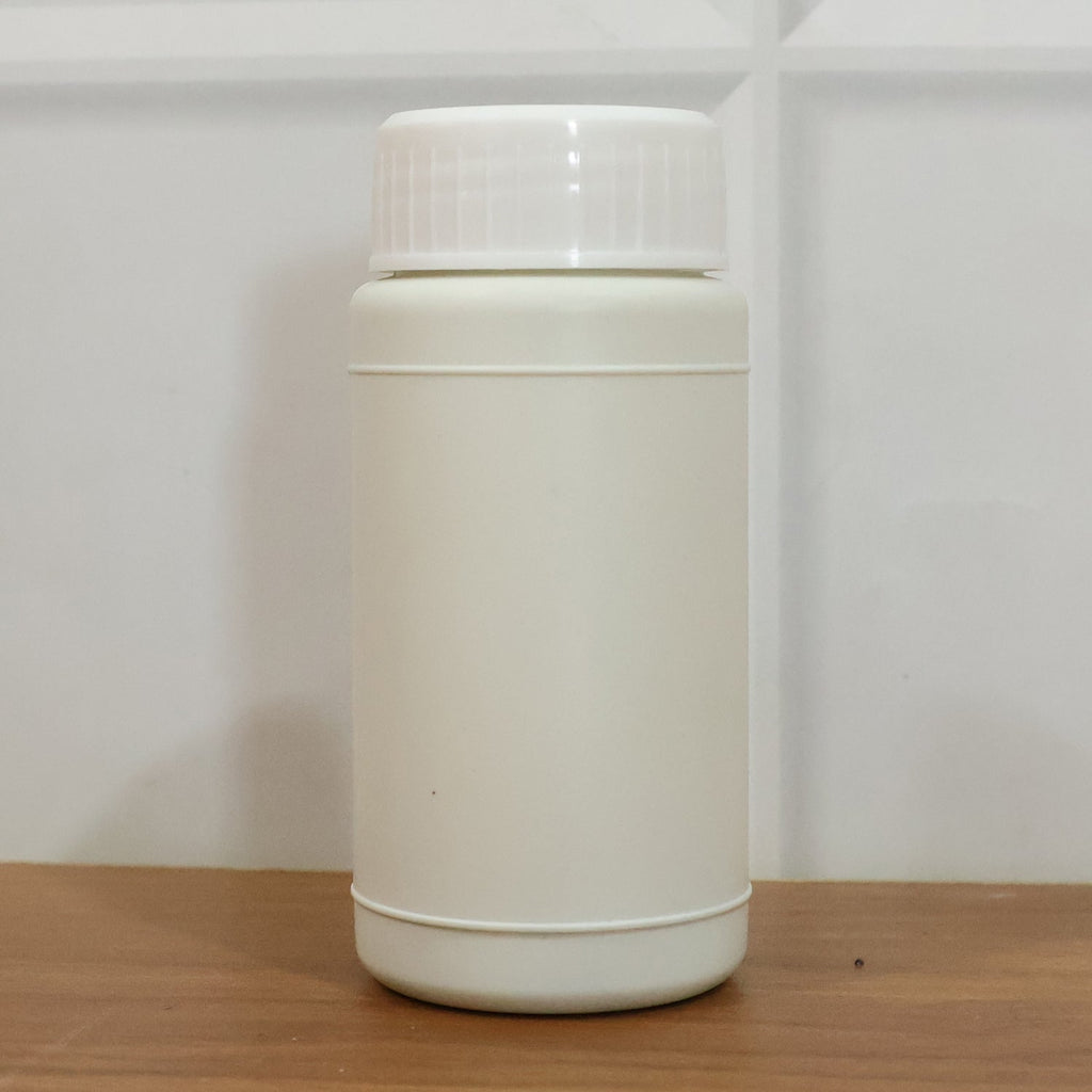 Blue automatic toilet bowl cleaner tablet in water tank
