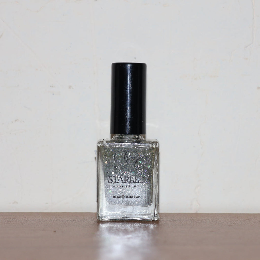 Bottle of Silver Moonlight Starlet Glitter Nail Paint with rich silver sparkle
