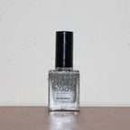 Bottle of Silver Moonlight Starlet Glitter Nail Paint with rich silver sparkle
