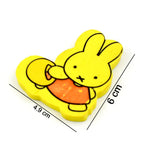 Detailed view of a charming cartoon eraser, highlighting its playful design.