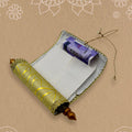 Assorted multi-color fabric money gift envelopes with scroll design.