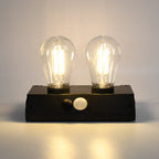 Indo Glow Solar Double LED Lamp providing ample light for an outdoor area.