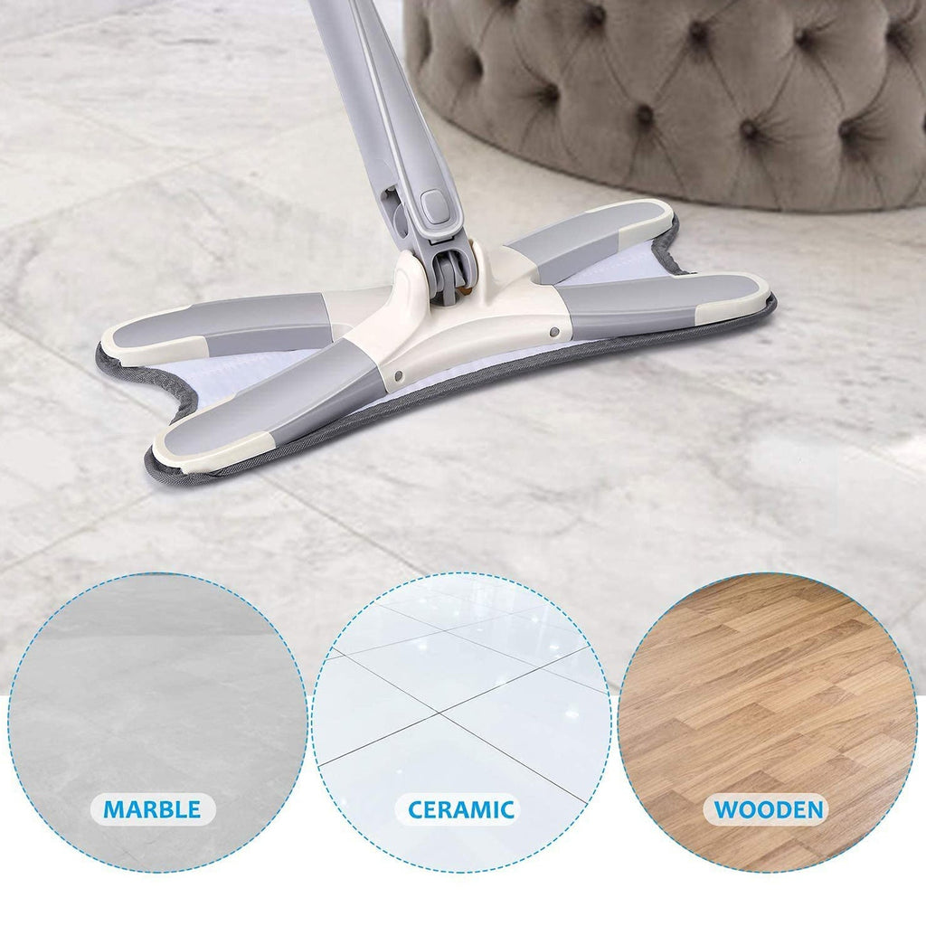 The adjustable Flat Mop handle extended for cleaning a high window or wall.