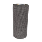 Hand demonstrating the flexible and easy-to-handle kitchen scrub cloth.
