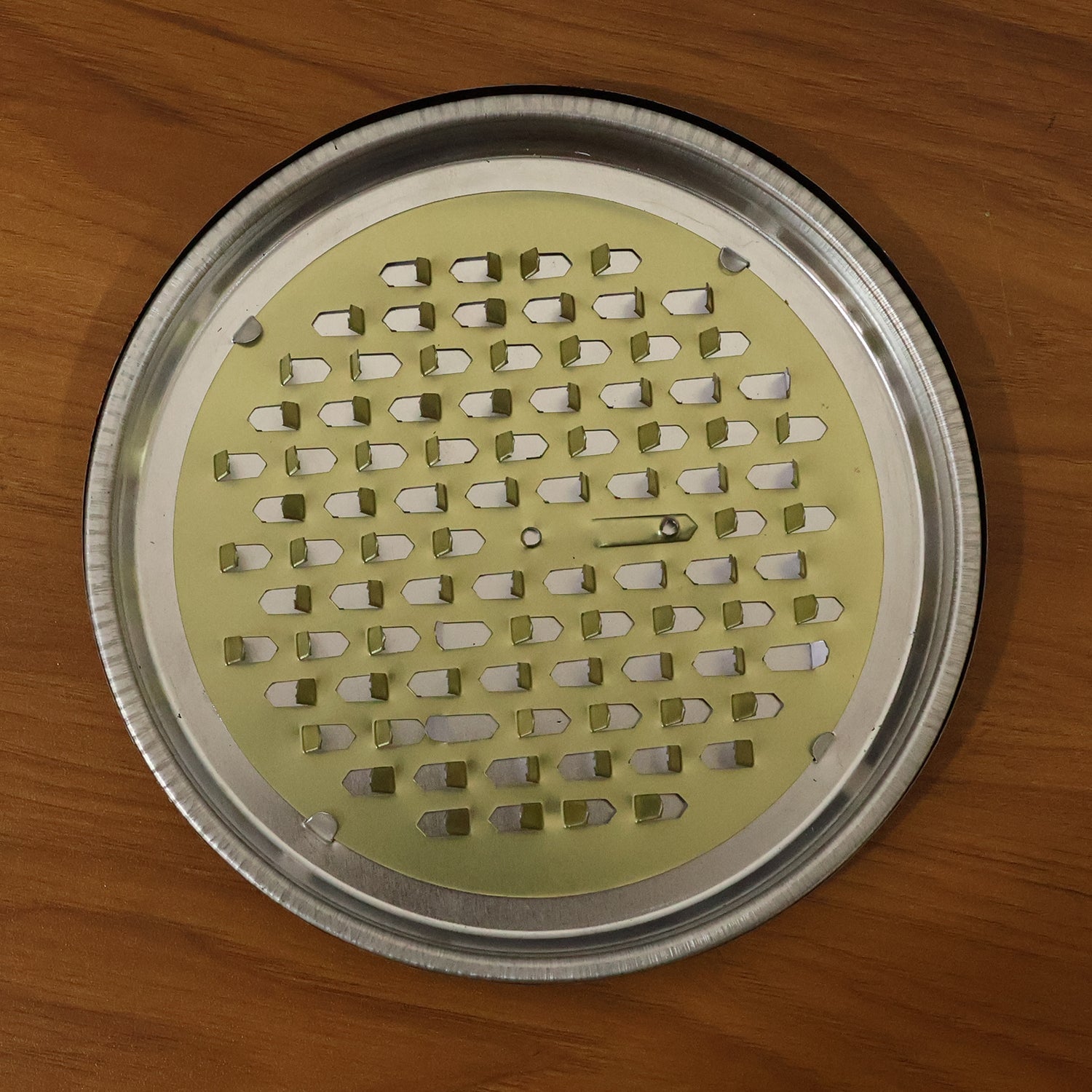 Sturdy metal mosquito coil stand for safe and clean coil burning