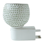 Soft warm glow from star cut glass aroma diffuser night lamp
