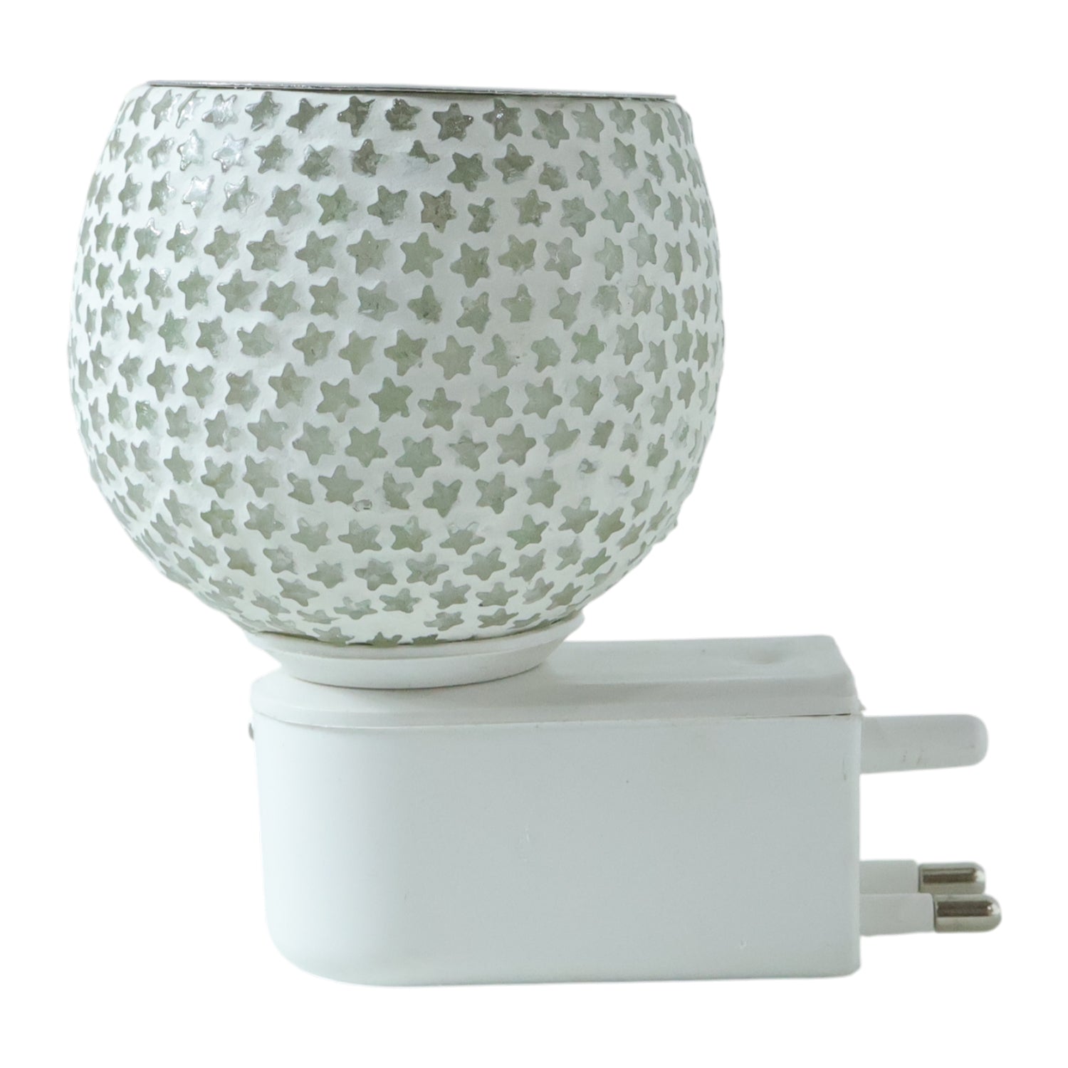 Soft warm glow from star cut glass aroma diffuser night lamp
