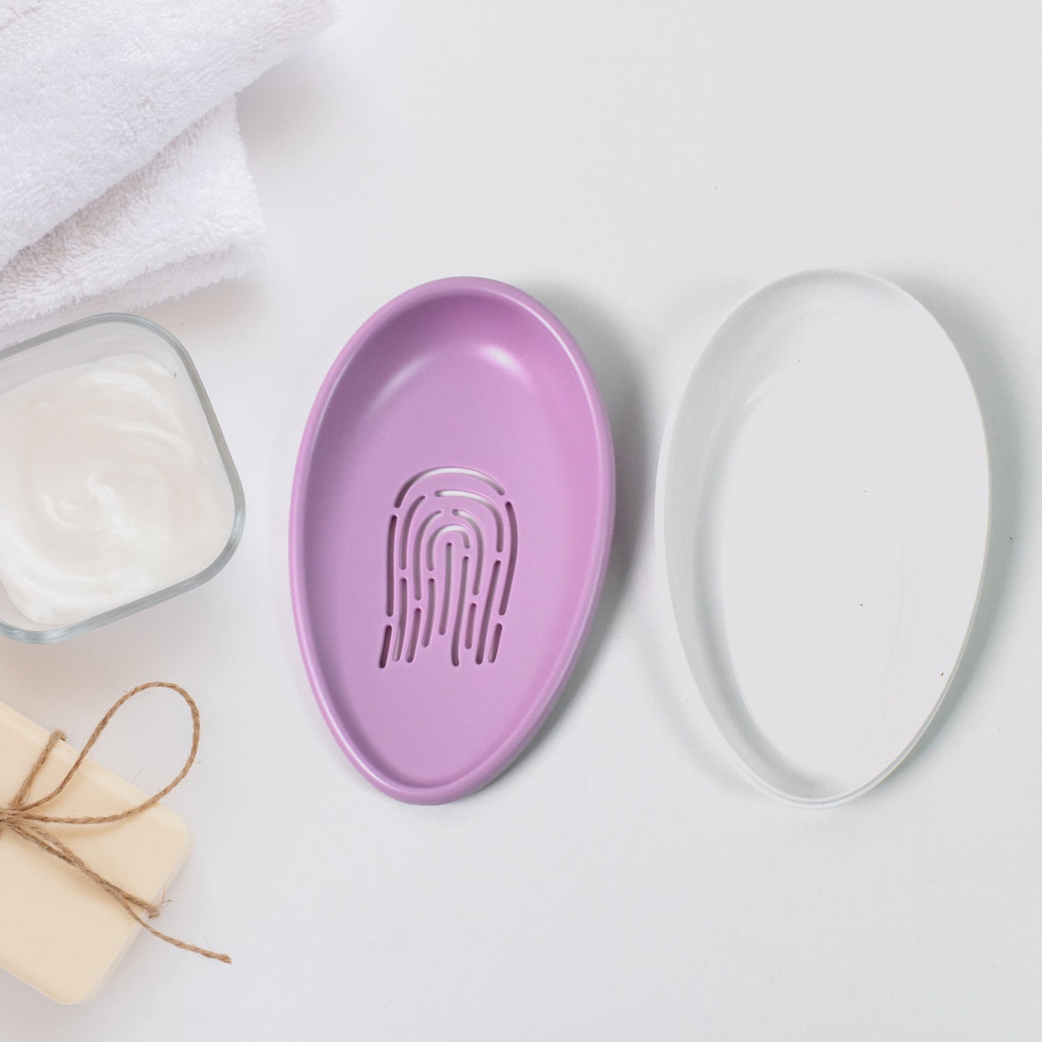 Bottom tray of the self-draining soap case collecting excess water, keeping surfaces clean.