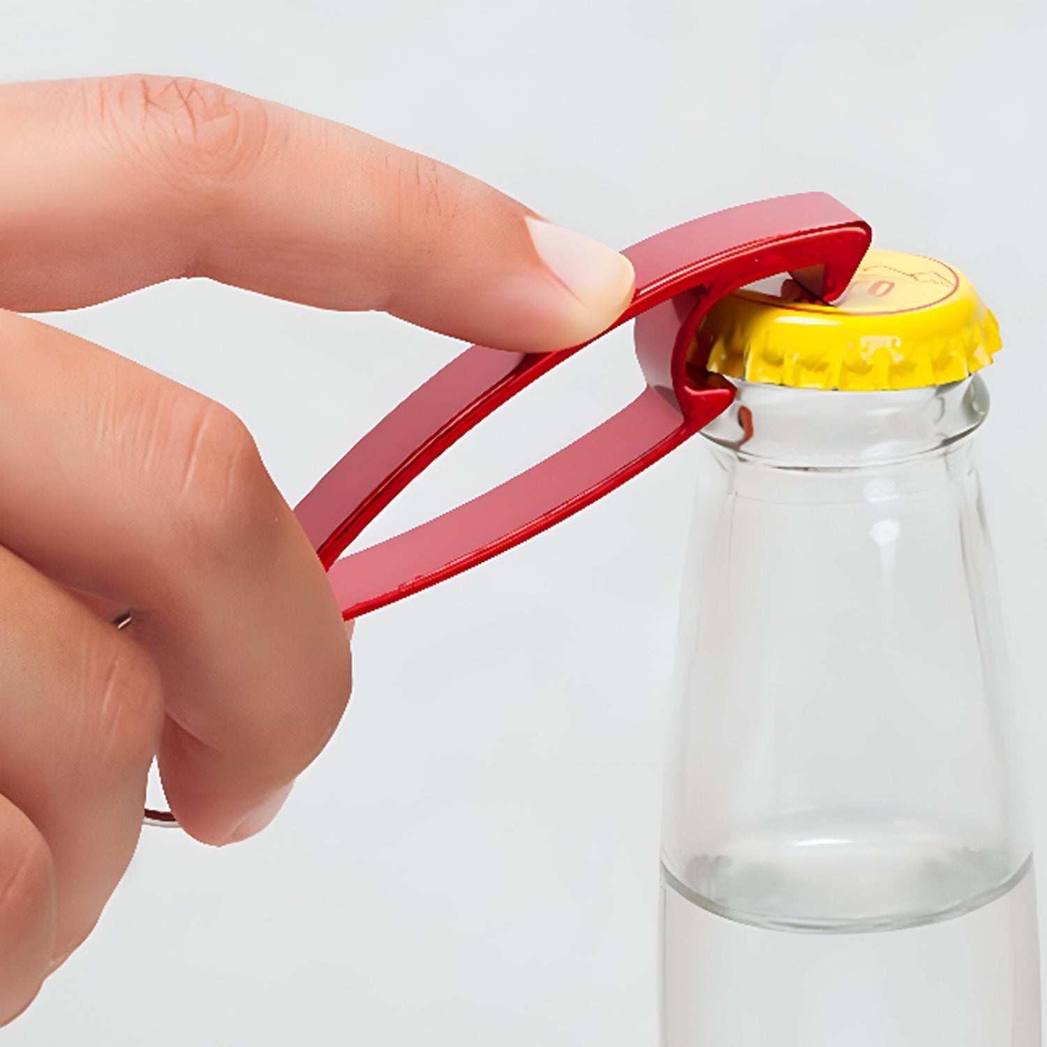 Portable bottle opener keychain suitable for travel and daily use