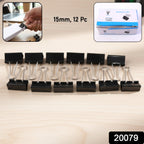 Close-up of black metal paper binder clips for office use
