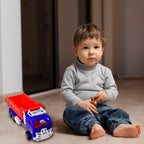 Children's hands playing with the non-toxic Friction Power Truck Toy.
