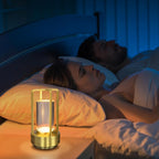 Elegant Crystal Table Lamp glowing with warm light on a wooden table.