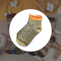 Pair of grey women's ankle socks, showcasing soft texture and comfortable fit.