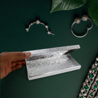 Interior view of decorative silver multipurpose cash box showing storage space