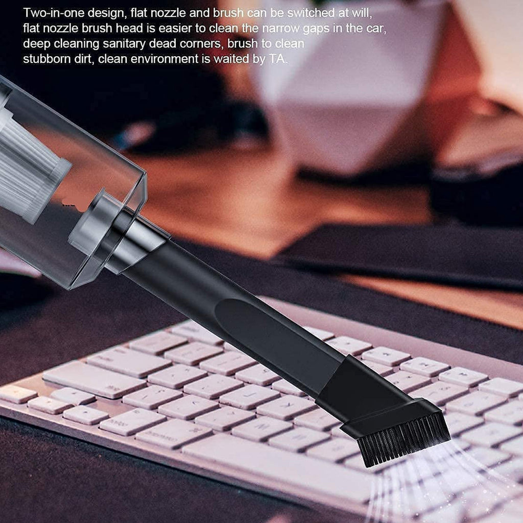 Cordless vacuum cleaner with its integrated LED light illuminating a dark area.