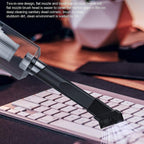 Cordless vacuum cleaner with its integrated LED light illuminating a dark area.