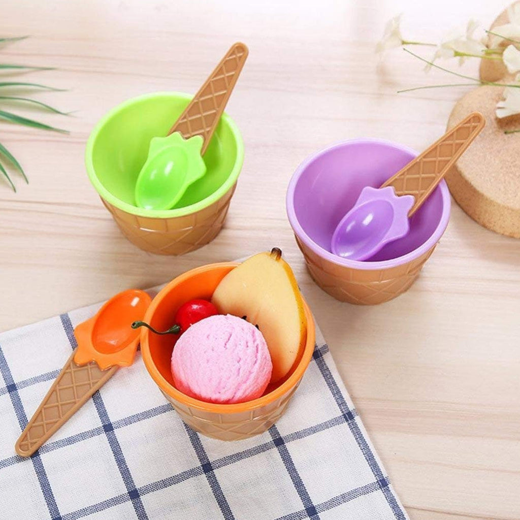Two stylish ice cream bowls with waffle design and matching spoons.