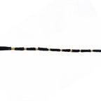 Red Mauli rakhi with gold and pearl details for festival