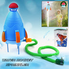 Children laughing while being sprayed by the rocket water sprinkler.