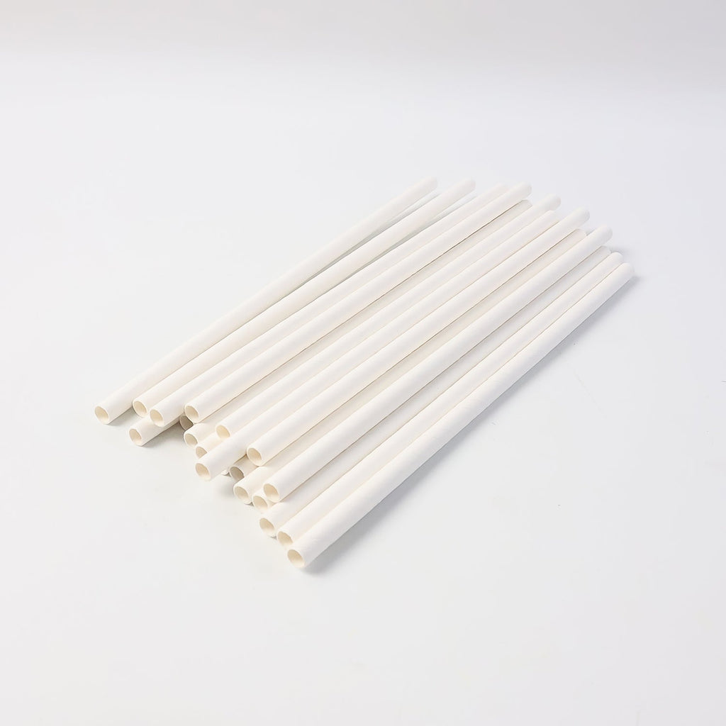 Eco-friendly paper straws displayed with green leaf, highlighting sustainable use
