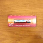 AAA ultra alkaline battery front and side view for electronic use