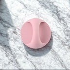 Plastic handle grip mounted on a cabinet door