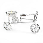 Decorative cycle tealight stand with candle enhancing living space ambiance