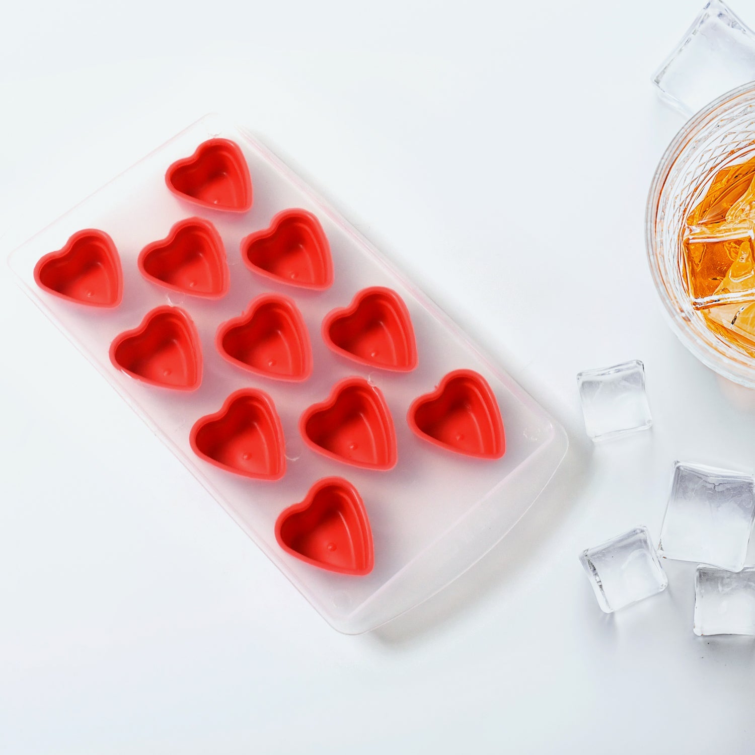 Empty silicone mold ice tray showcasing various fruit shapes.