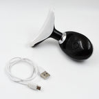 The portable Neck Face Massager shown with its USB charging cable.