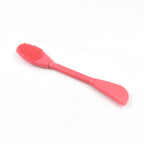 Ergonomic silicone face mask applicator for comfortable and controlled skincare application.