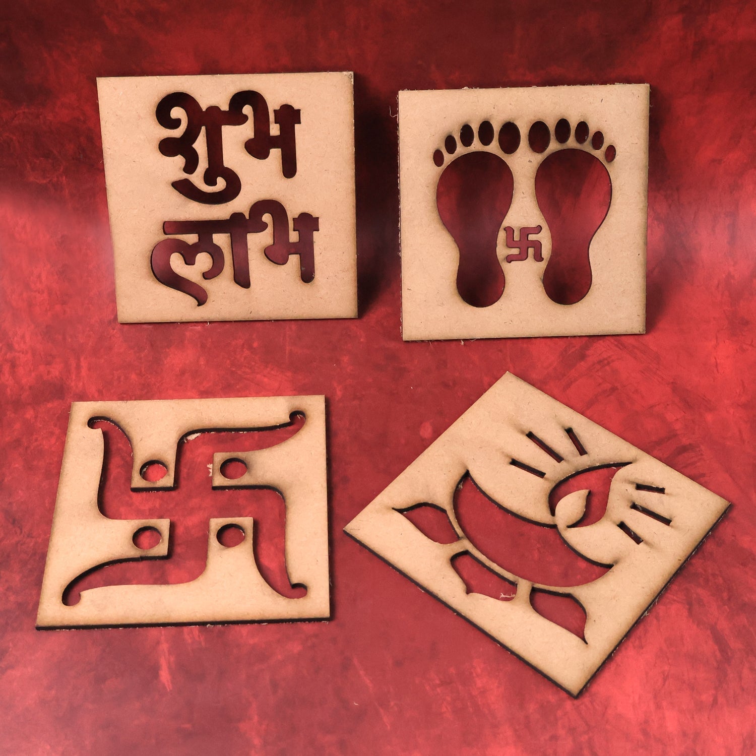 Close-up of Diya and Footprint motifs wooden decorative cutouts