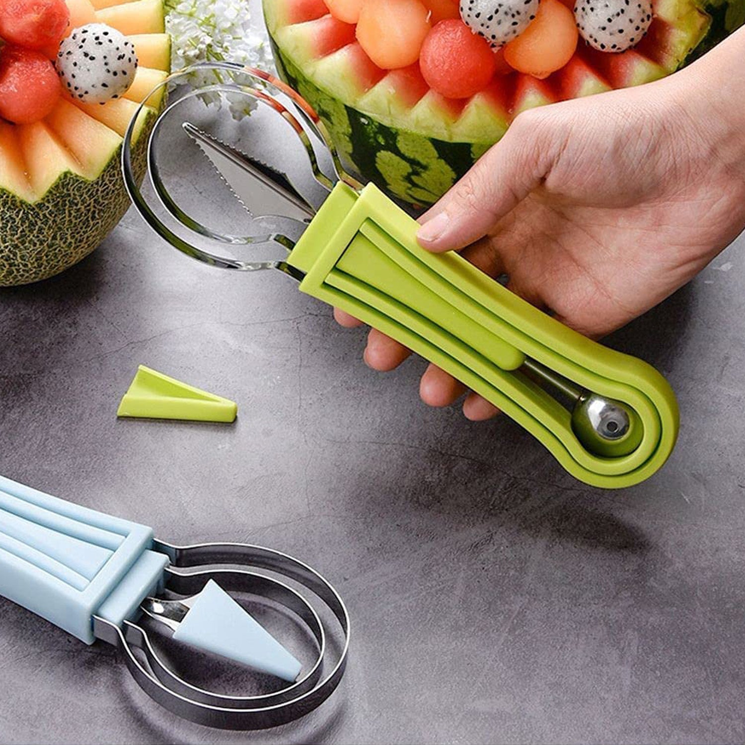 The three versatile tools of the 4-in-1 fruit baller set, separated for different tasks.