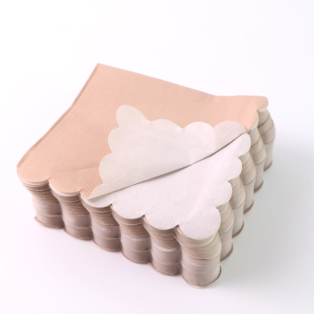 Luxury scalloped tissue napkin set showcasing refined paper texture