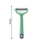 Ergonomic handle on vegetable and fruit peeler for comfortable grip